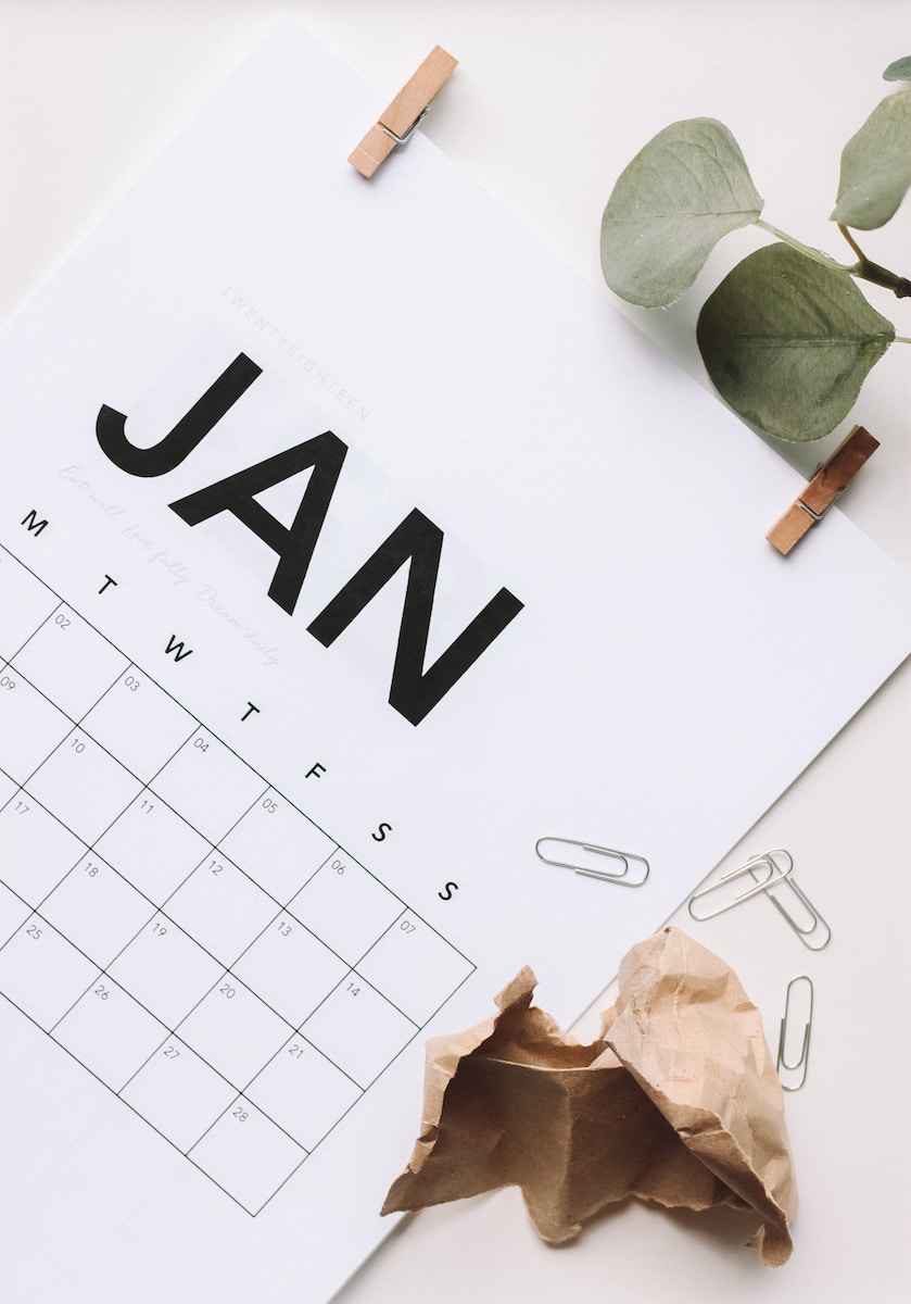 January white calendar with leaves on it